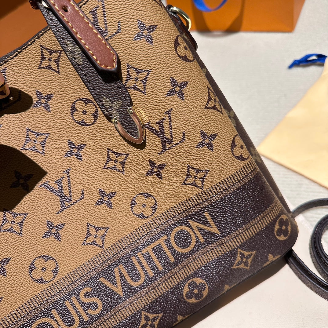 (82) Louis Vuitton Bag